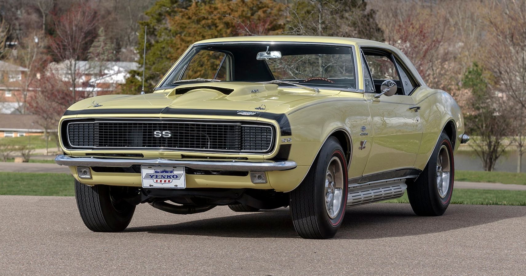 Yellow 1967 Chevrolet Yenko Camaro SS parked outside