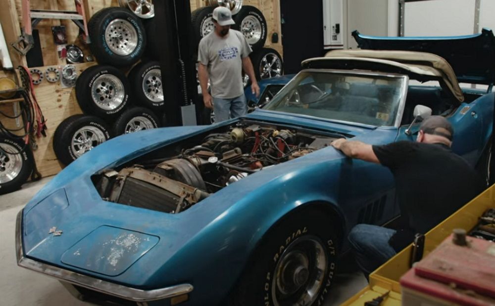 Tracy Yeager (left) and Darron Cheney work on a 1968 Chevrolet Corvette