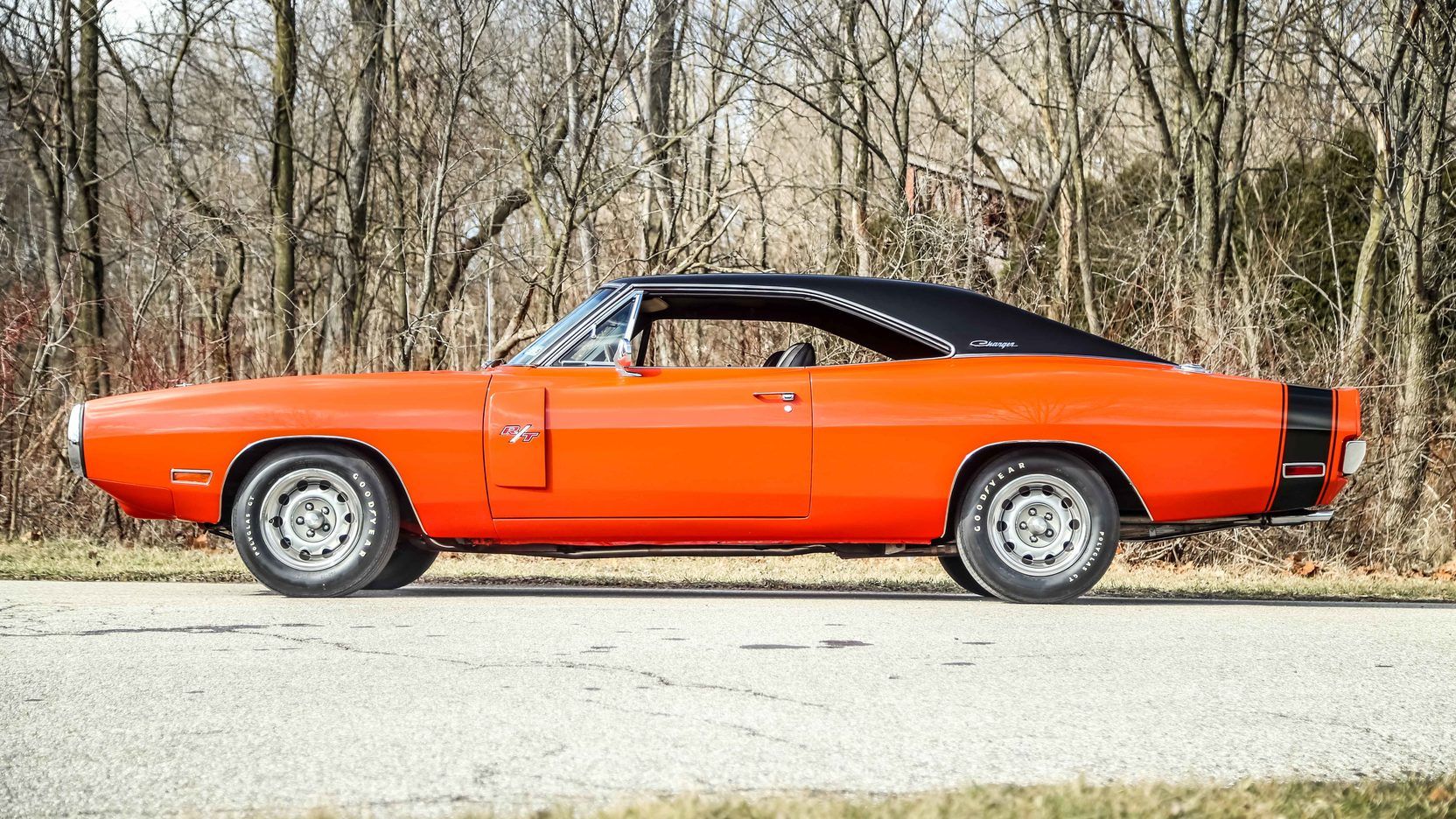 A parked orange 1970 Dodge Charger R/T