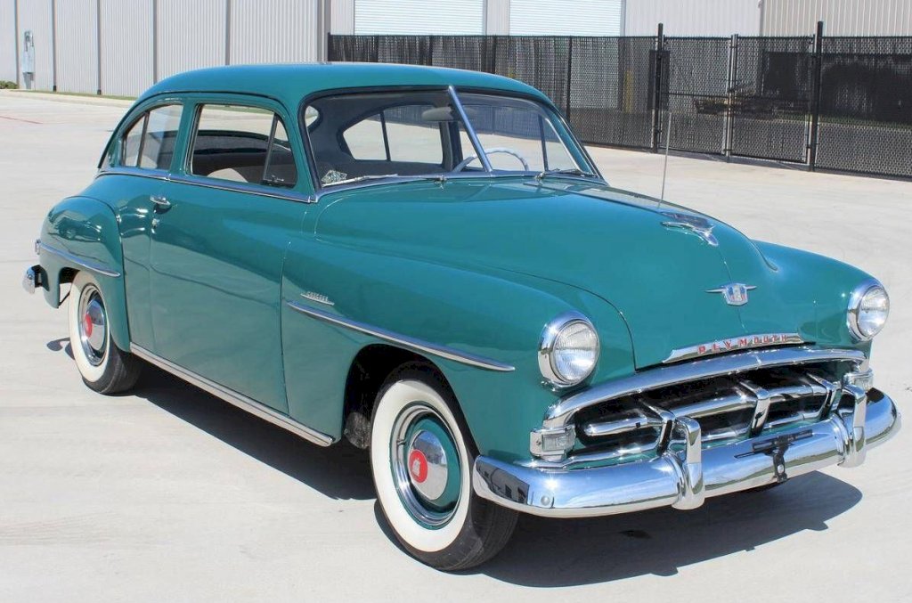 The front of the 1951 Concord was adorned with a modest chrome grille, which was a common design element in cars of that era. 