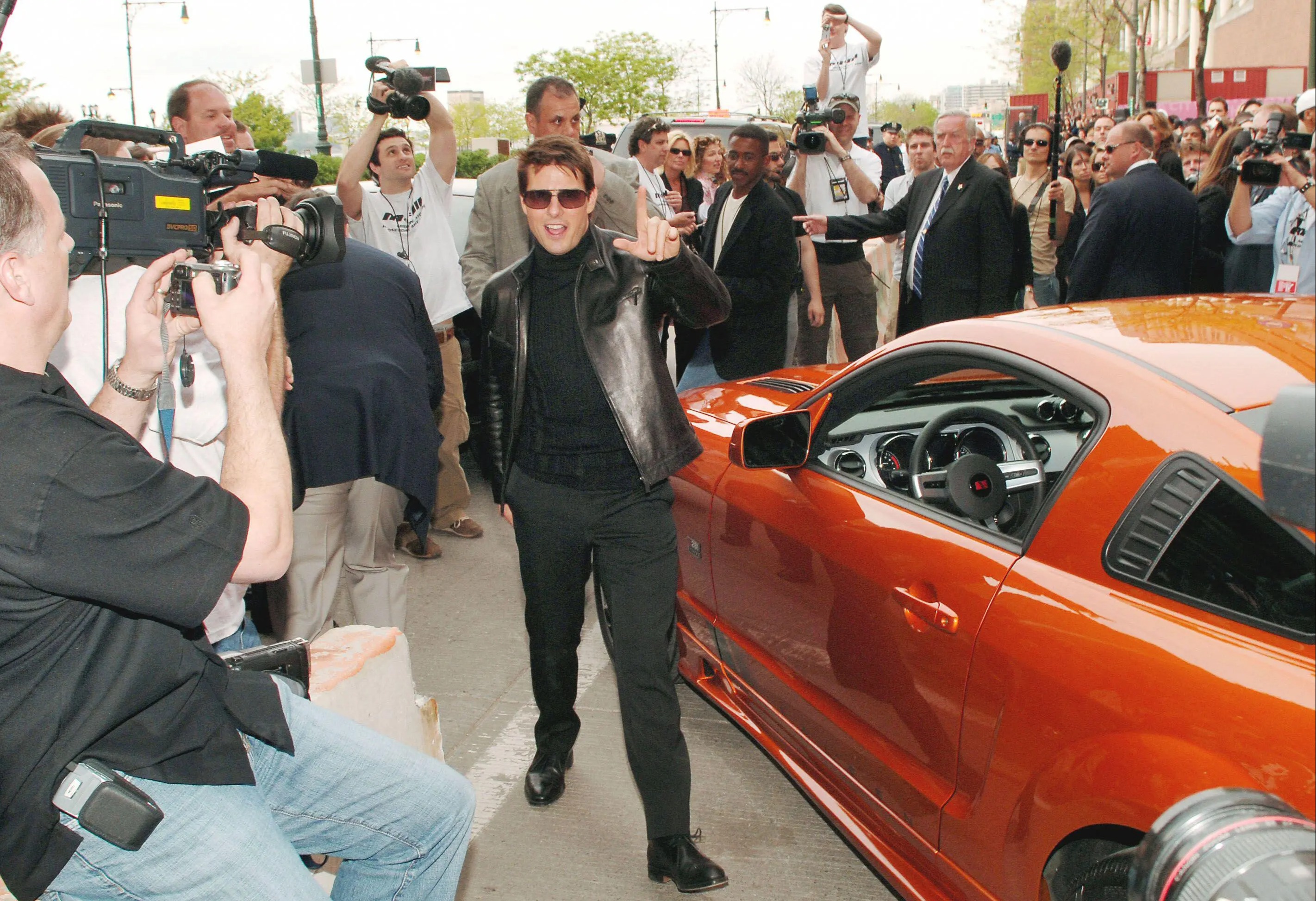 Tom Cruise with his Ford Mustang Saleen sports car