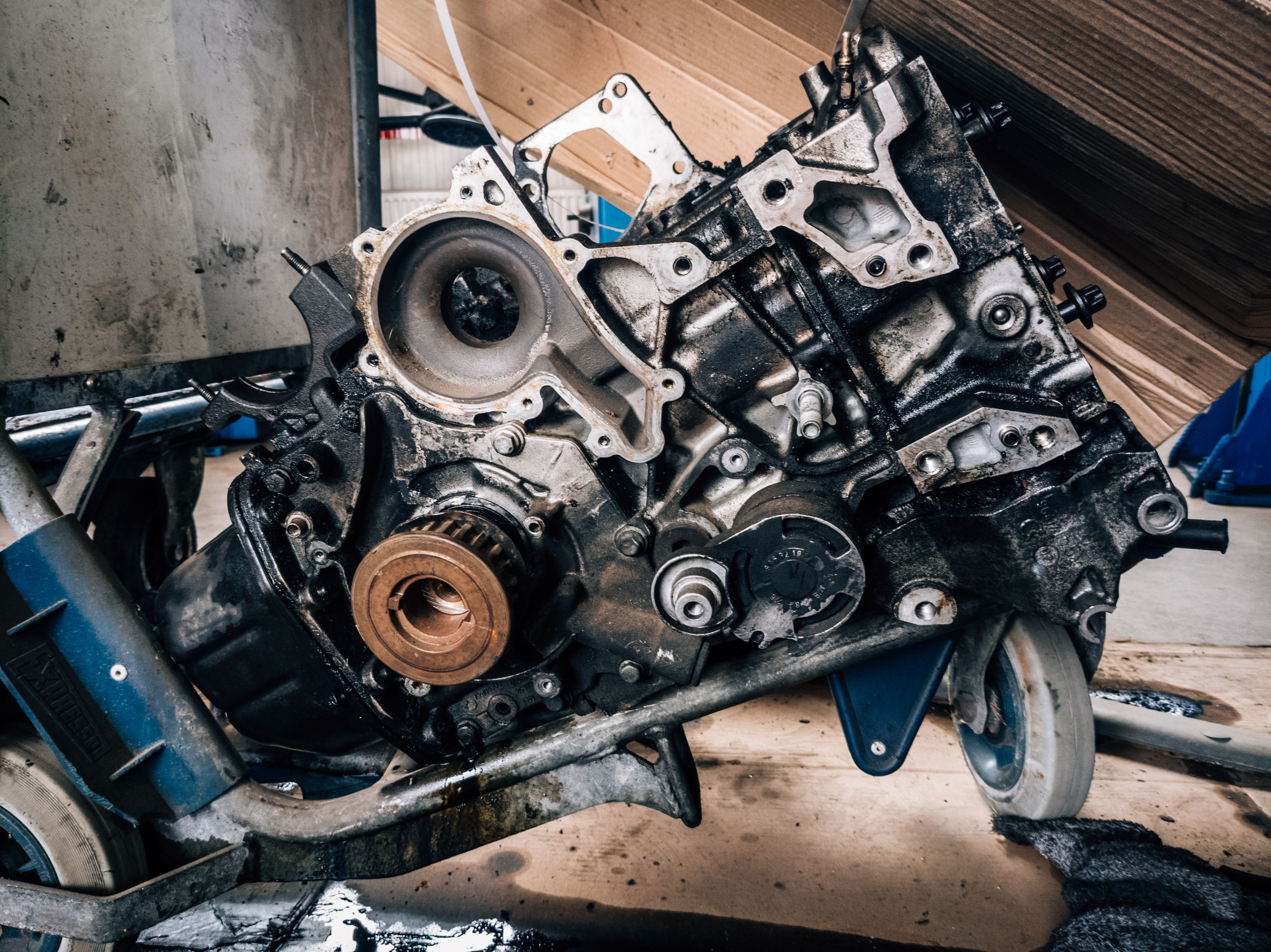 A dirty engine in a rolling bin