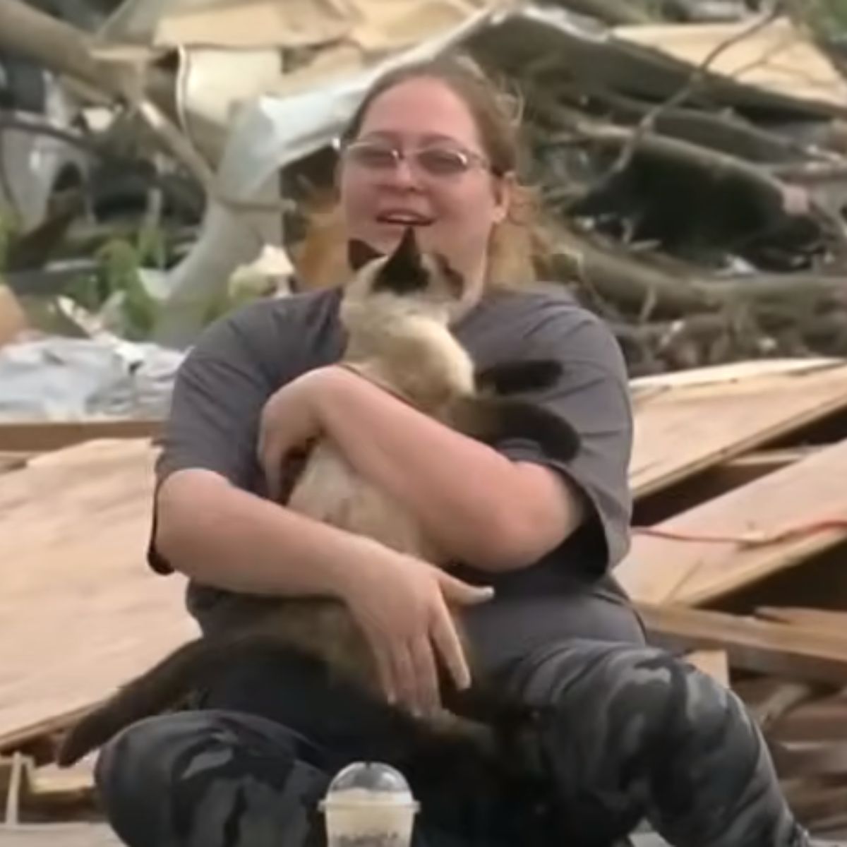 woman holding the cat