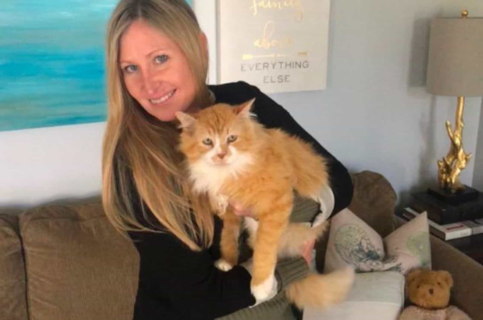 blond woman with cat