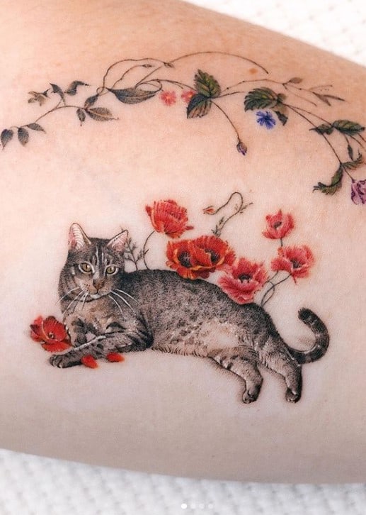 cat tattoo with flowers