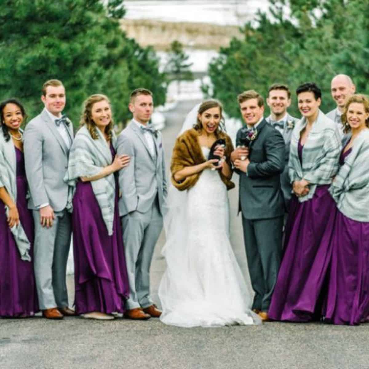 group of people at the wedding and two cats