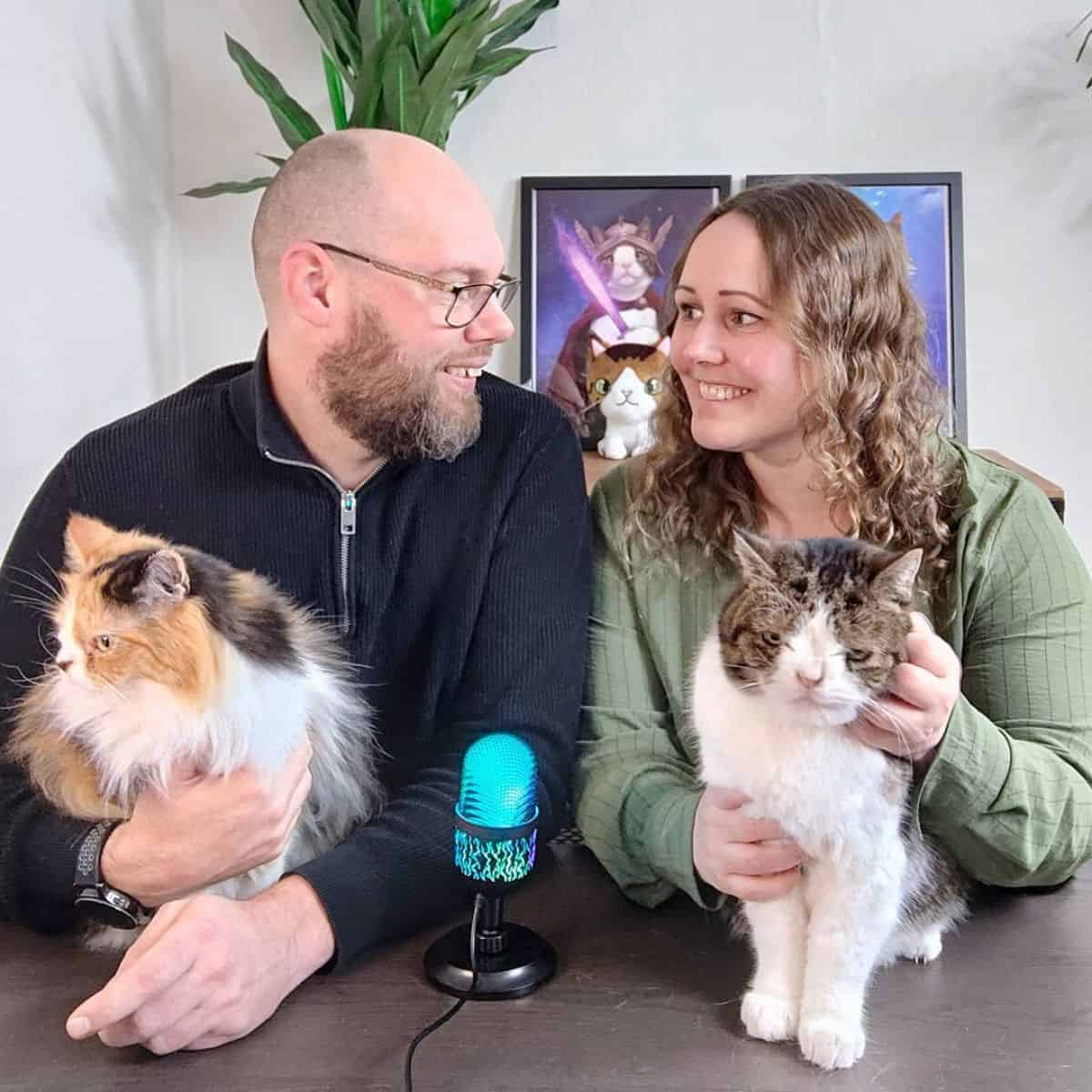 happy couple with cats