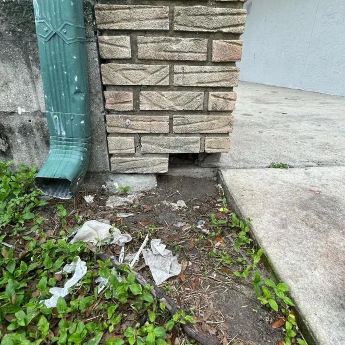 photo of a hole in a brick wall