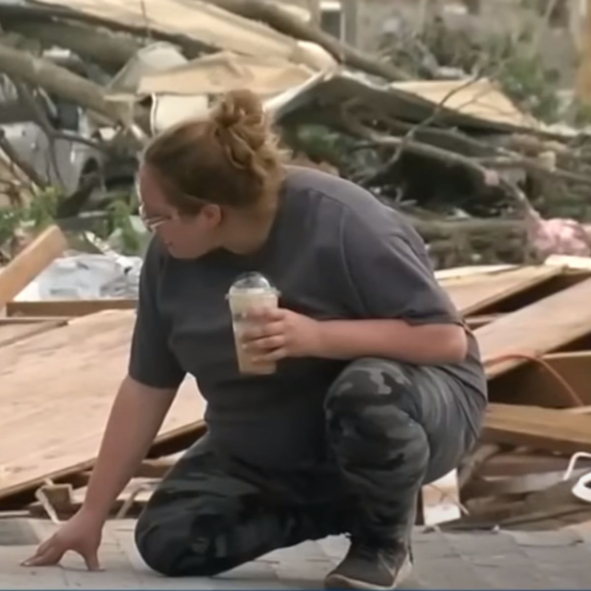 woman kneeling on the ground