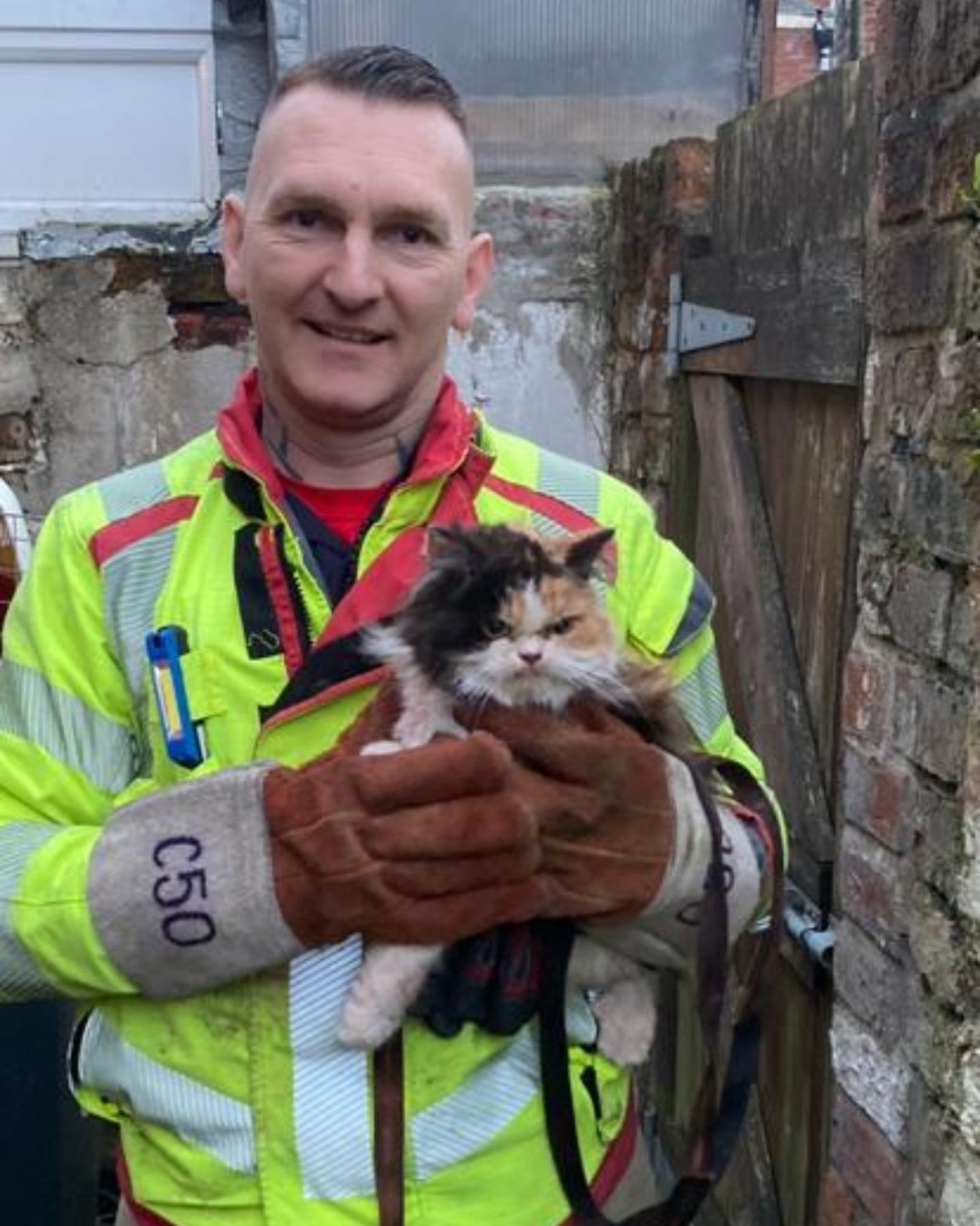 firefighter and kitten