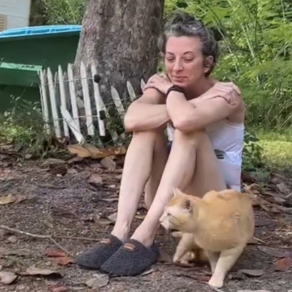 woman sitting with cat