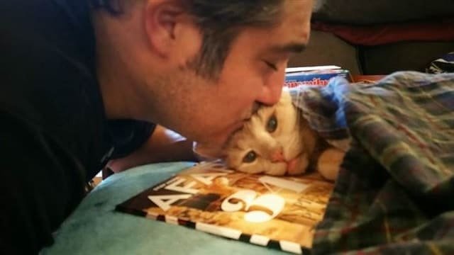 Tigger’s dad, Michael Trentadue, gives him a kiss.